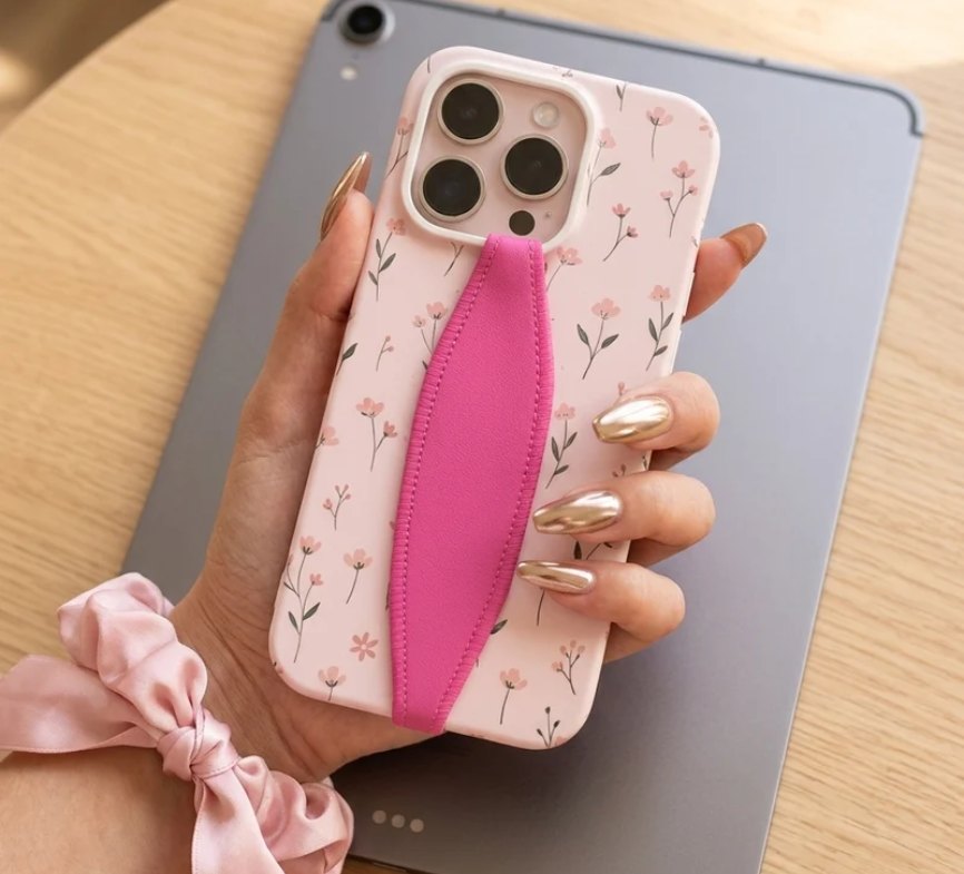 Hot pink strap on a floral case